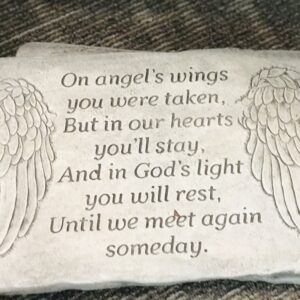 Stone Memorial On Angels Wings