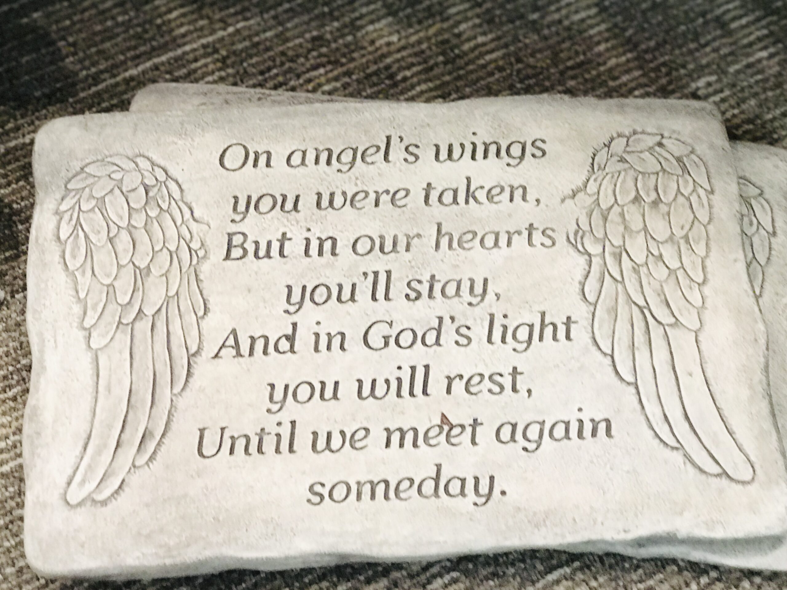 Stone Memorial On Angels Wings